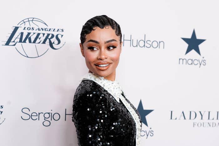 Blac Chyna wears a sparkly top with finger waves