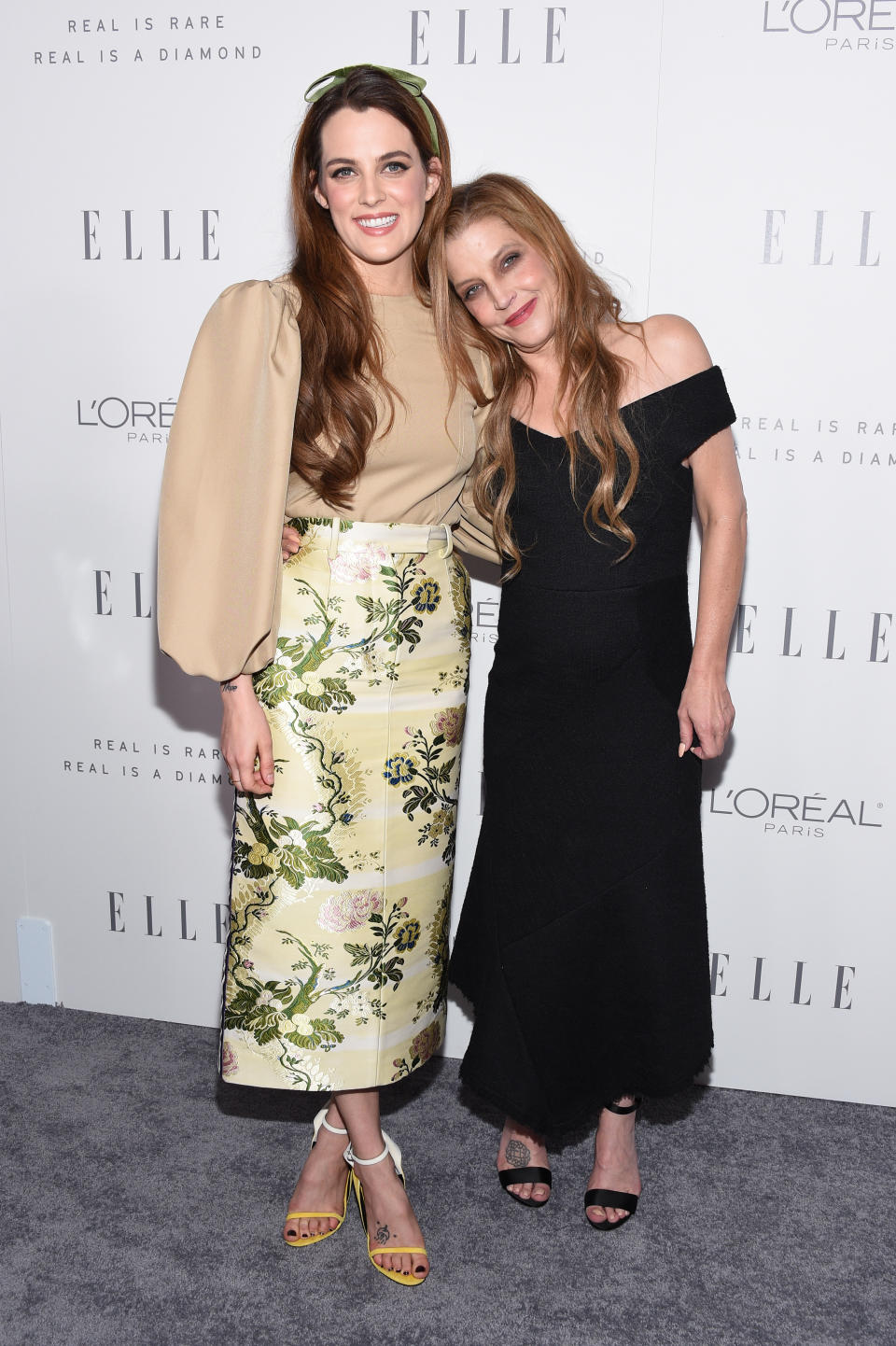 Riley Keough and Lisa Marie Presely (Photo by WWD/Penske Media via Getty Images)