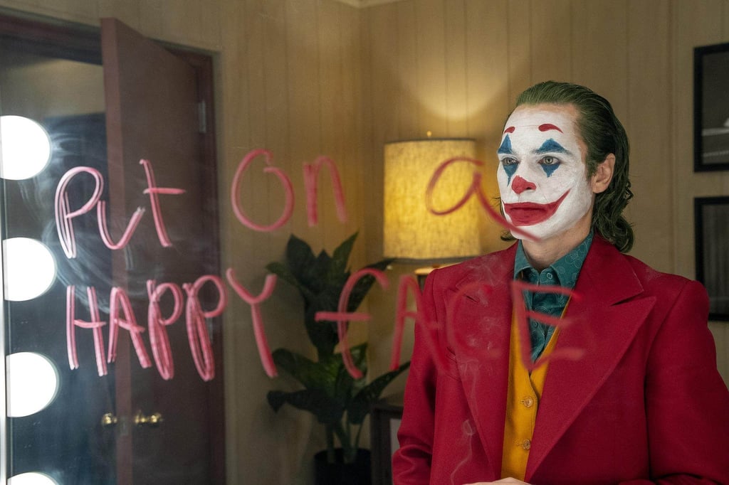 Joaquin Phoenix in Joker, a film he says is about “childhood trauma, gun violence, isolation and mental health”. Photo: Warner Bros