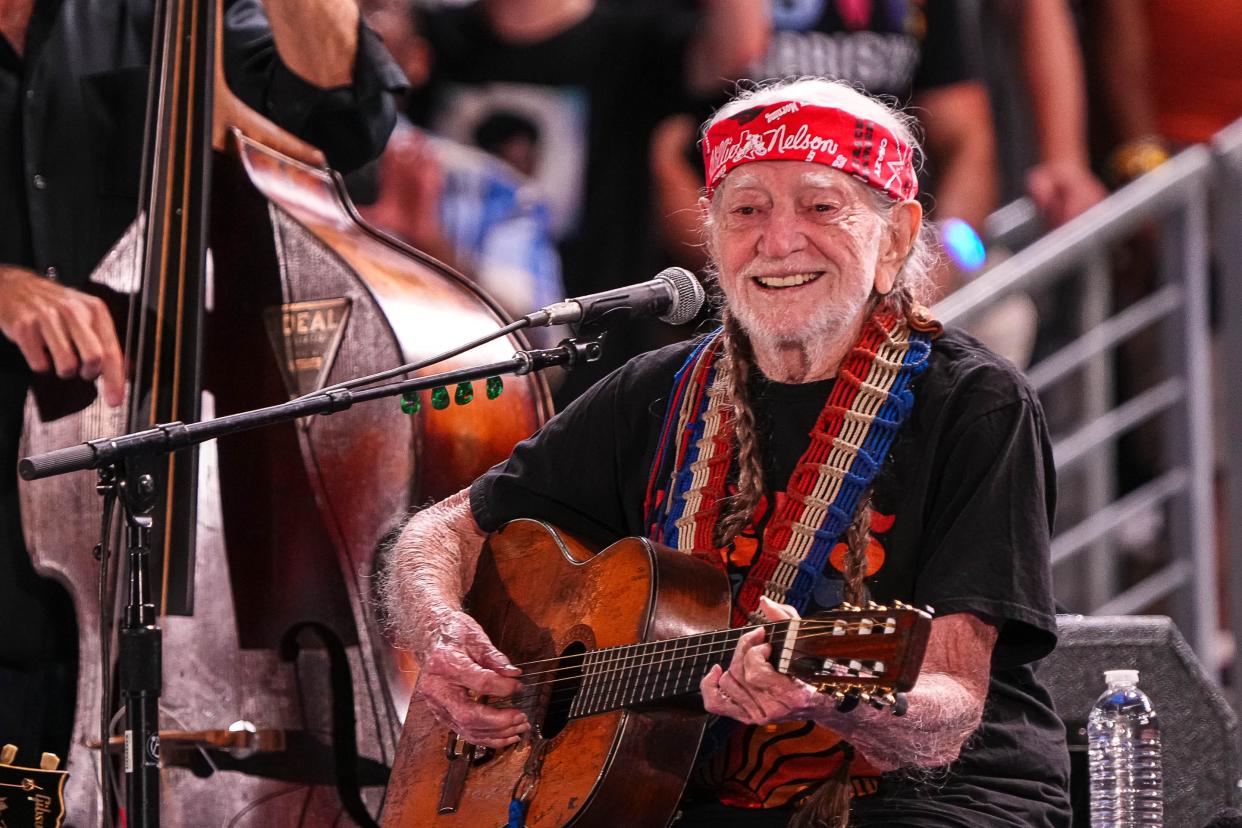 Musician Willie Nelson performs during a rally for Vice President Kamala Harris at Shell Energy Stadium on Friday, Oct. 25, 2024 in Houston, Texas.