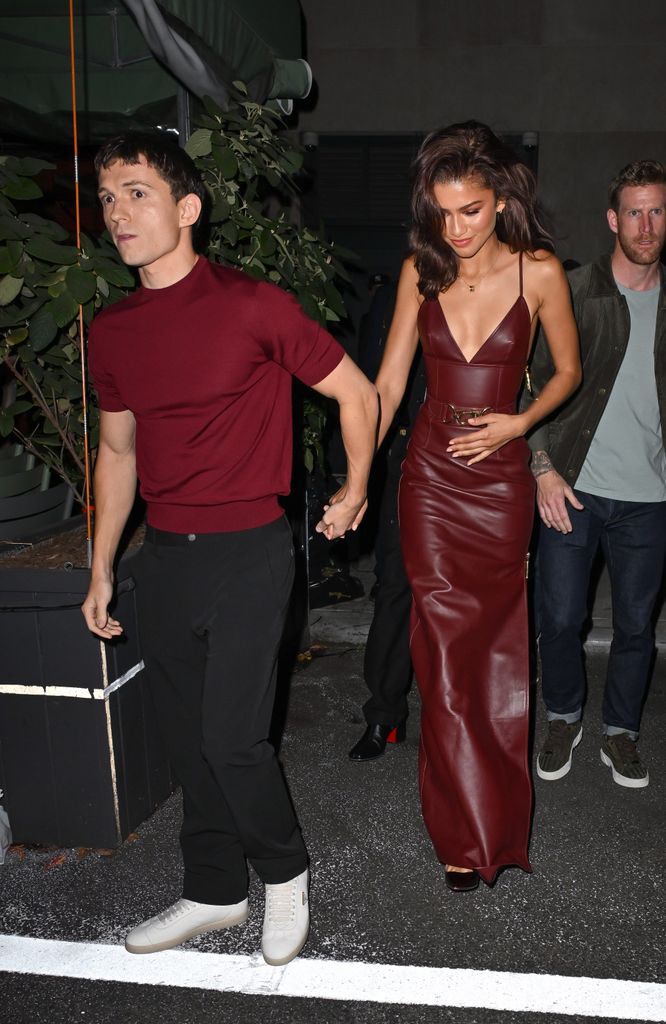 Tom Holland and Zendaya in burgundy seen leaving the Corner Bar 