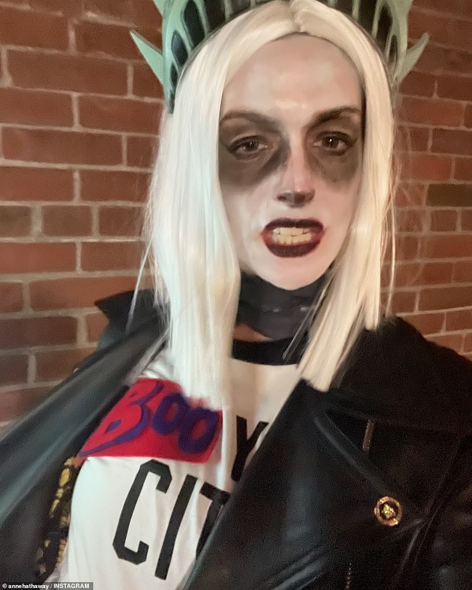 She leveled up her look with pale toned makeup, dark undereye circles, deep velvet colored lipstick and sharp eyeliner. 'Boo York City,' she captioned the carousel of photos along with various Halloween themed emojis