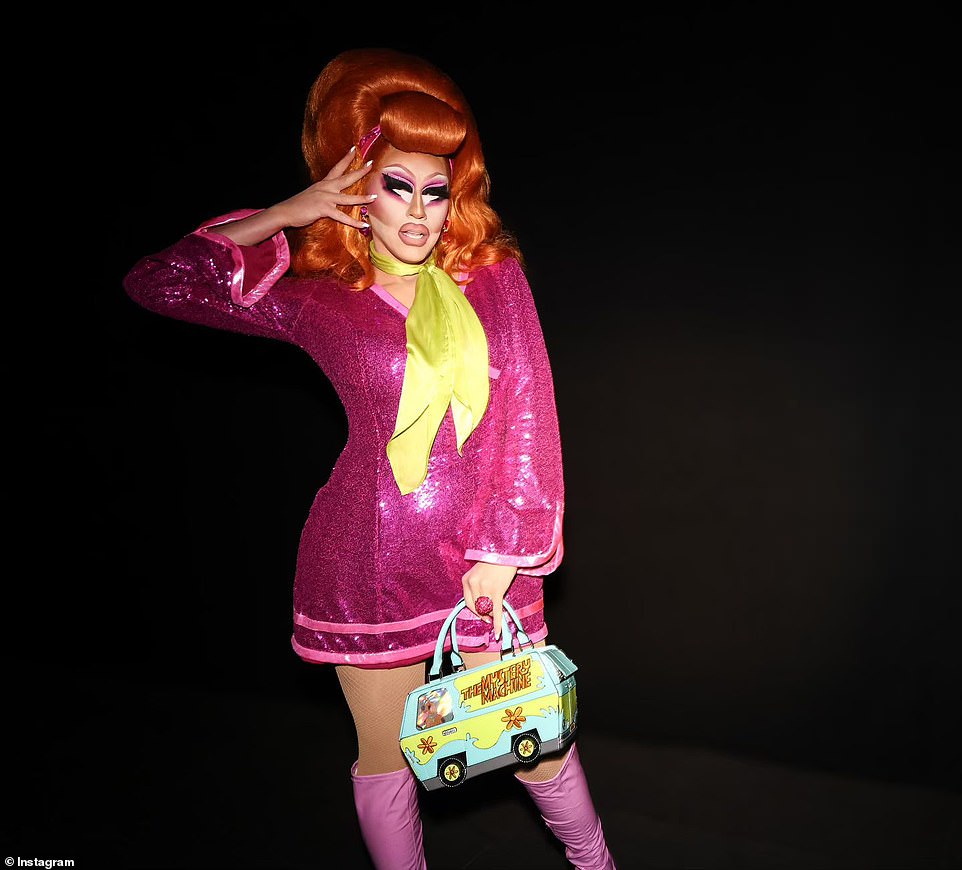 Trixie Mattel, 35, was dressed up as Daphne from Scooby-Doo in a glittering pink dress and a red wig