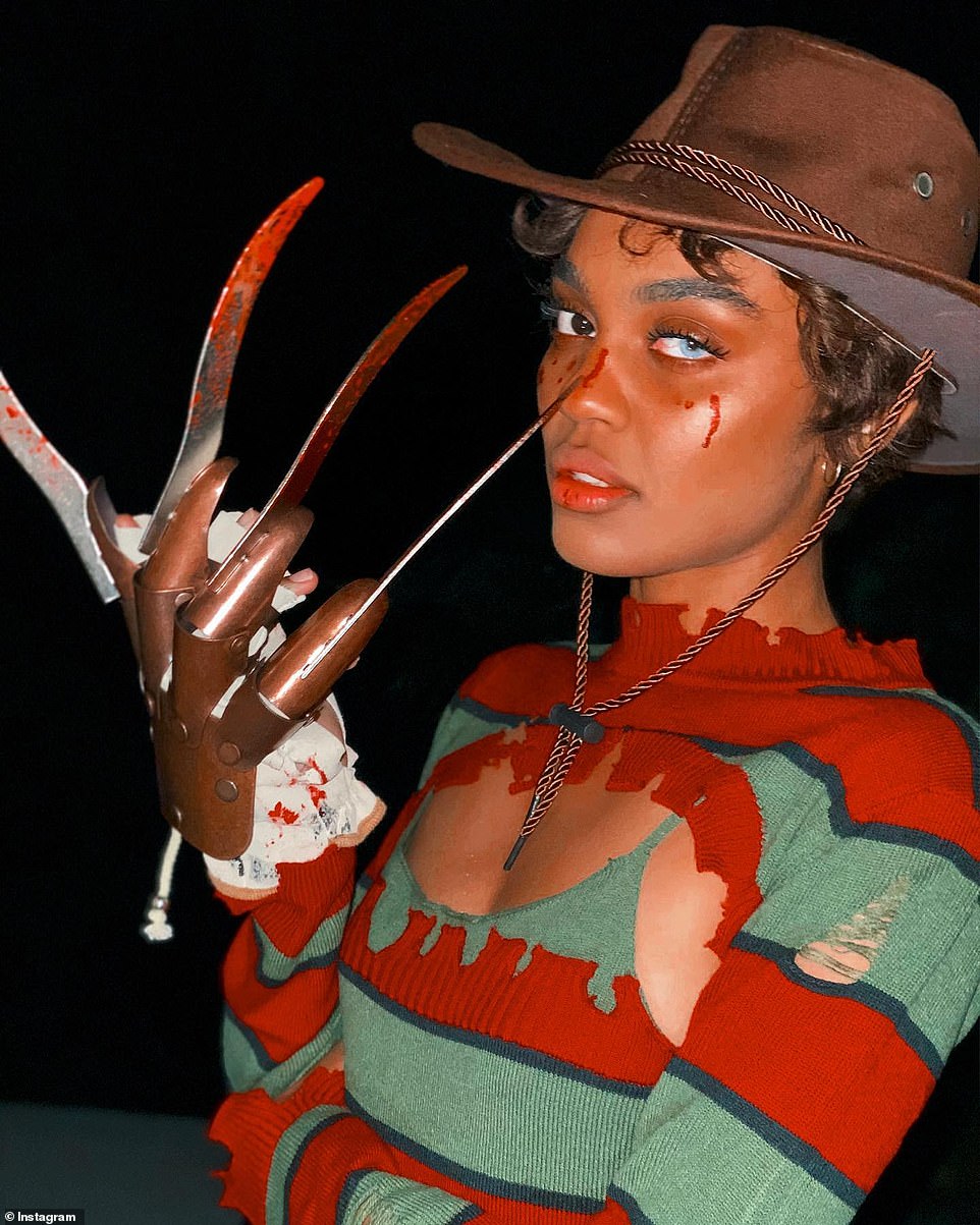 China Anne McClain, 26, dressed up as Mrs. Freddy Krueger, wearing the character's iconic glove with razor-sharp blades