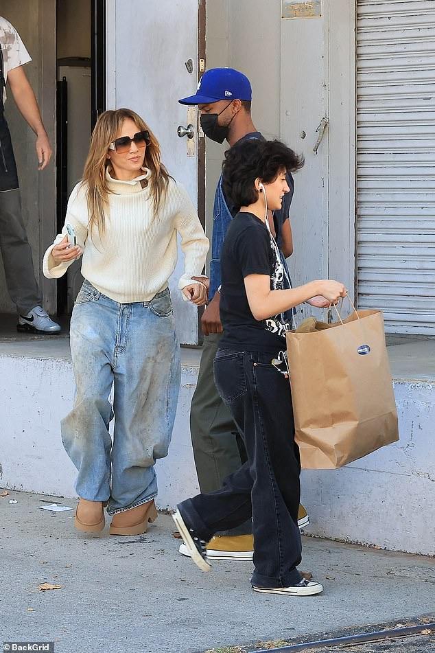 Jennifer Lopez, 55, proved she was a master of casual-cool style during a family shopping trip in Los Angeles with her child Emme on Wednesday