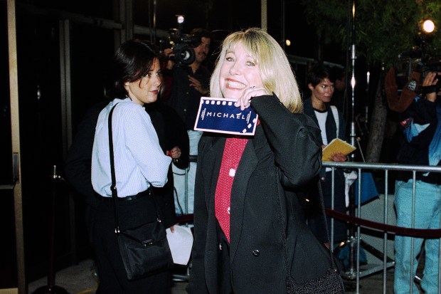 Actress Teri Garr shows off her ticket at the premiere...