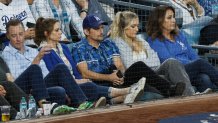 LOS ANGELES, CALIFORNIA - OCTOBER 25: Brad Paisley (C) looks on during Game One of the 2024 World Series between the Los Angeles Dodgers and the New York Yankees at Dodger Stadium on October 25, 2024 in Los Angeles, California. (Photo by Kevork Djansezian/Getty Images)