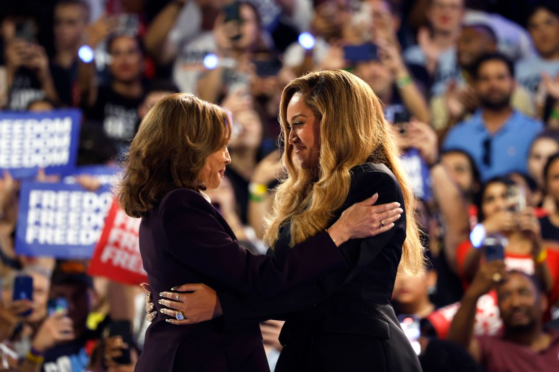 Beyoncé, right, and Vice President Kamala Harris embrace at a rally in Houston on October 25, 2024.