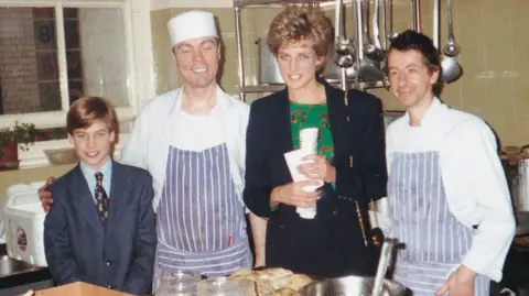 The Passage Prince William, as a child, pictured with his mother, Princess Diana, in the kitchens of the Passage homelessness charity in December 1993