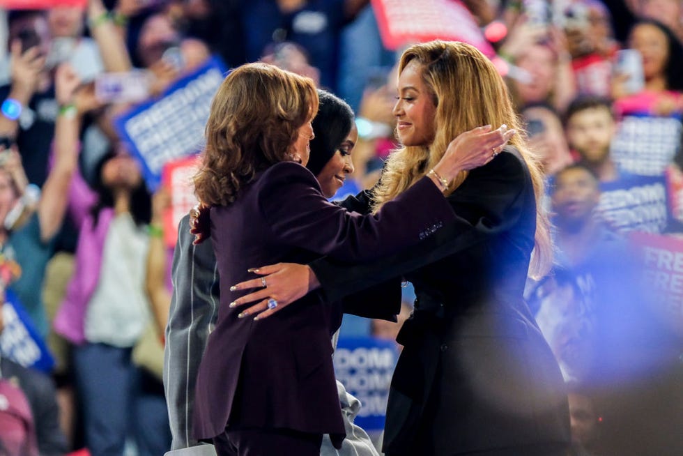 us vice president kamala harris, left, greets singer beyonce knowles carter, right, and musician kelly roland, center, during a campaign event at shell energy stadium in houston, texas, us, on friday, oct 25, 2024