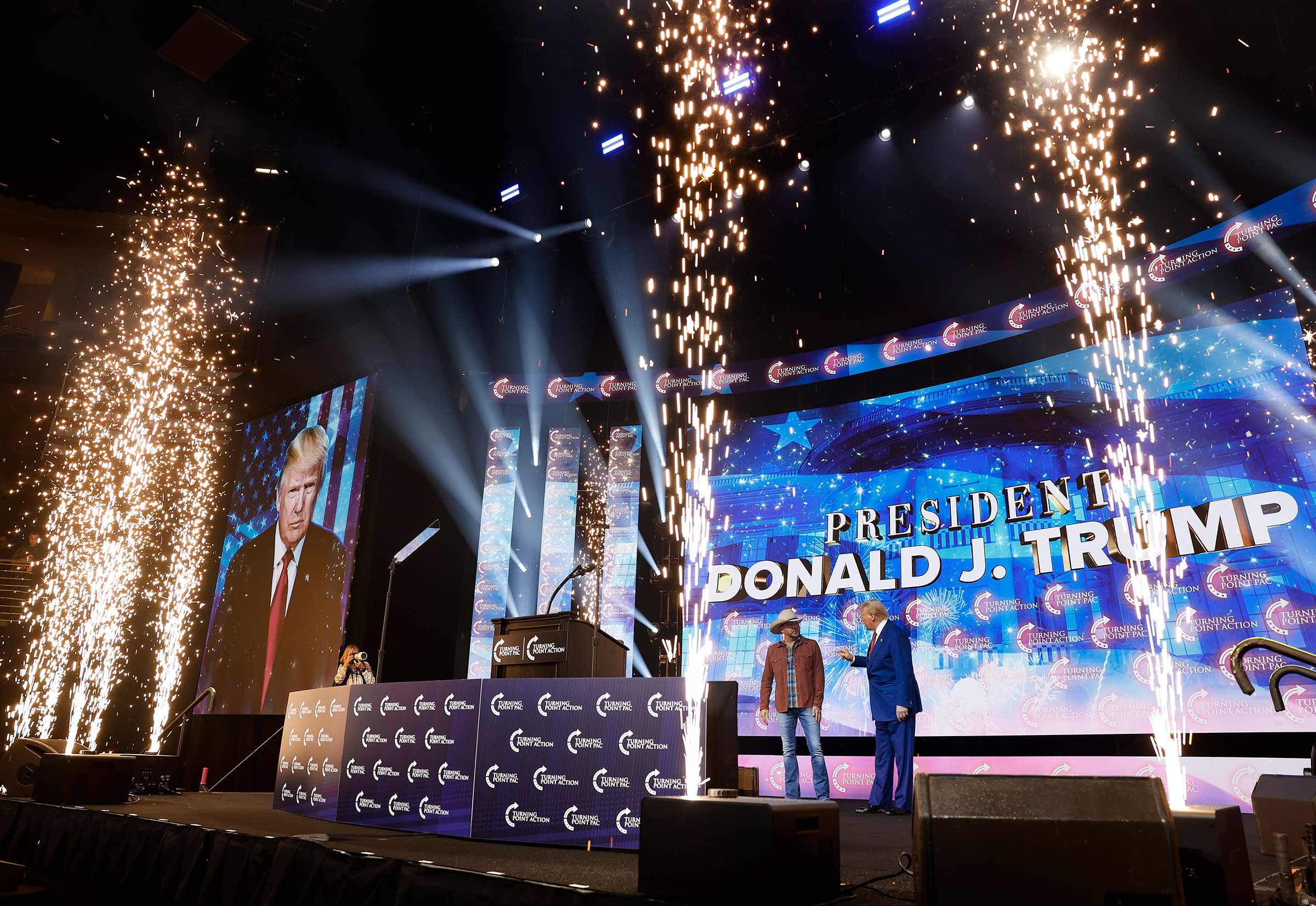 Jason Aldean introduces Trump at a Turning Point PAC campaign rally in Duluth, Ga. on Oct. 23.