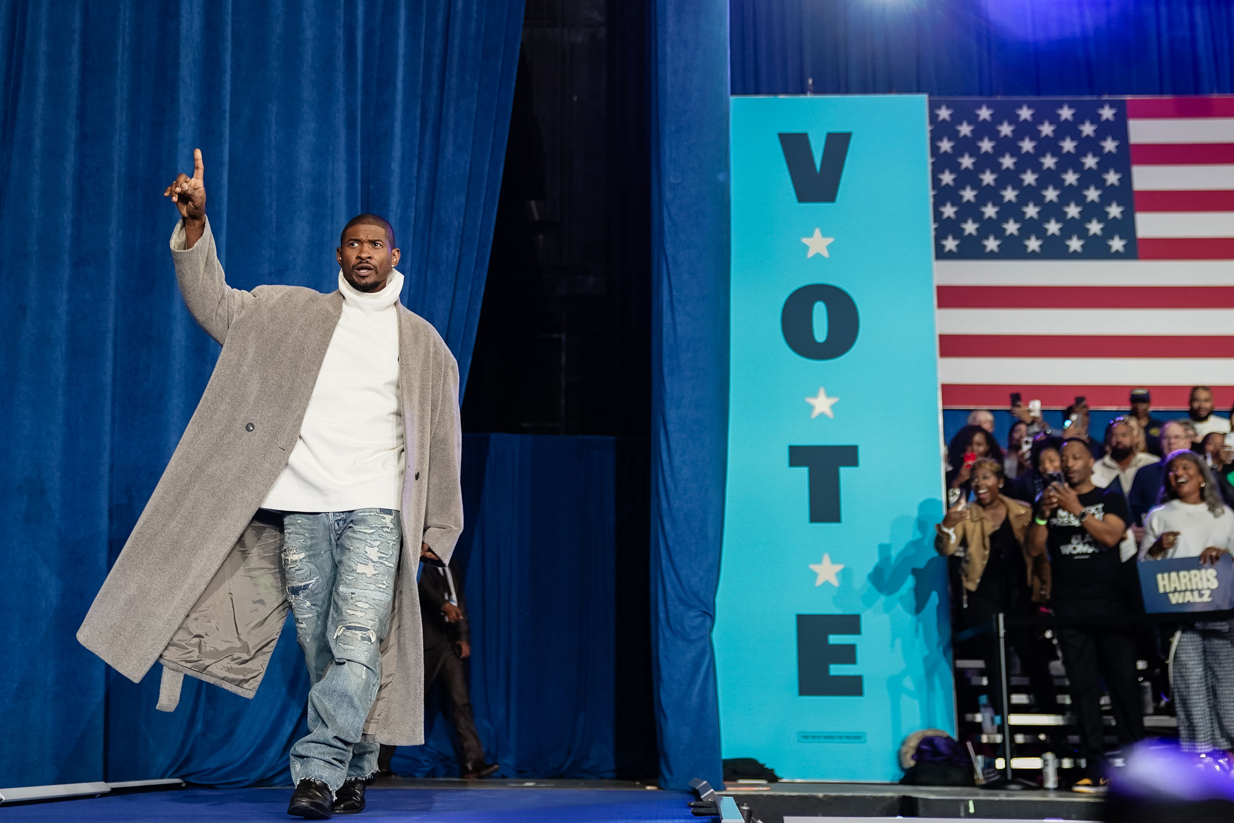 Usher takes the stage at a rally it Atlanta on Oct. 19.