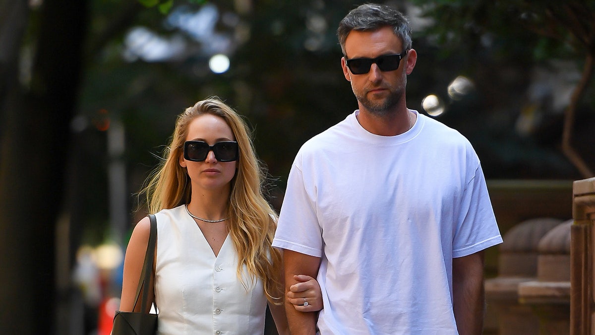 Jennifer Lawrence and Cooke Maroney walking in New York